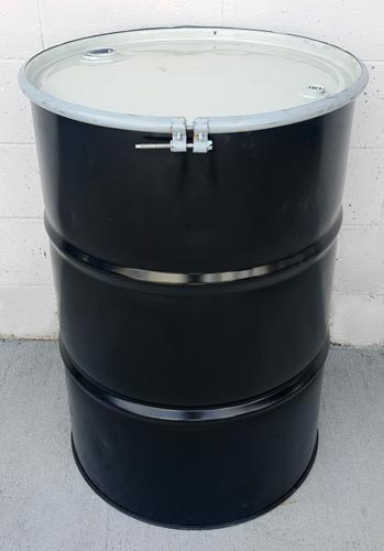 Reconditioned 55 gallon Drum with concrete background