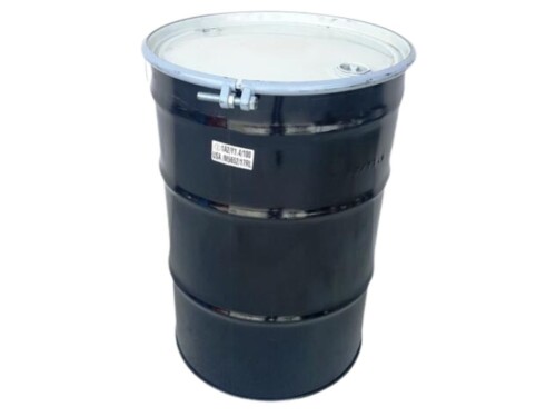 55 gallon hazardous materials metal drum with concrete background