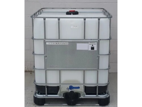 new 275 gallon IBC tote with concrete background