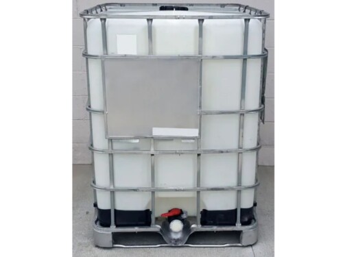reconditioned 330 gallon tote with concrete background