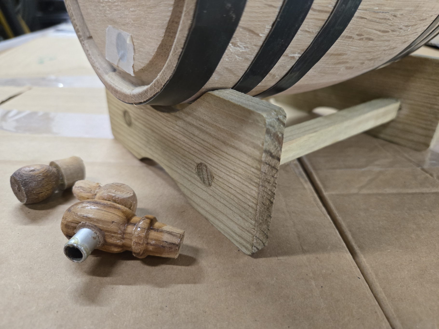 small wooden barrel bungs with stand and barrel detail